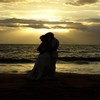 Married on a beach in Maui, just the two of us, the photographer, and the preacher man.